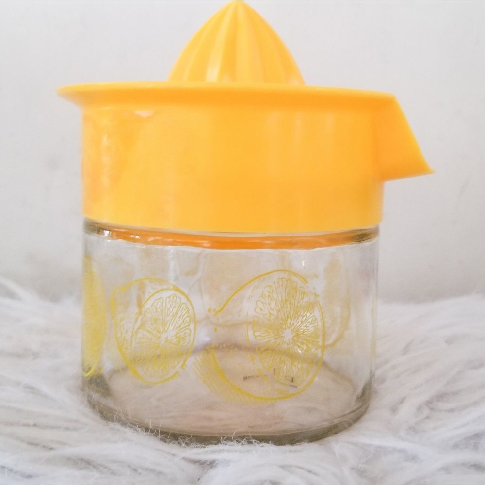 Vintage lemon juicer glass bottom
